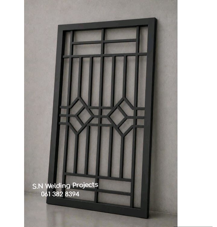 Freestanding decorative steel panel with a geometric diamond design